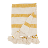 Striped towel with tassels on a white background
