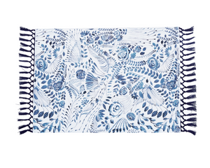 Add traditional charm to your dining table with these lovely placemats. Each one features a navy blue and white floral design accented by tassels in each end. These placemats, which are sold individually, are a great way to a feminine touch to dining area without using pastels. They also make for great wedding gifts.  These placemats are proudly made in the USA.  Materials: 100% Cotton   Dimensions: 14" wide x 20" long