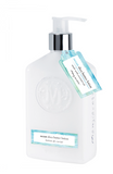 White lotion bottle with pump and blue label on a white background