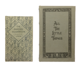 These enchanting book storage boxes come as a charming set of two: "All The Little Things" and "The Garden Guidebook." This set adds a touch of nostalgia and splendor to any bedroom, living room, entryway, or office. And they flawlessly complement a wide range of design themes. Place stationery or small keepsakes in these lovely storage boxes. Display on a side table with notepad and pen neatly stashed away.
