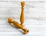  If you’re looking for rustic dining table decorations or fireplace mantel decor, look no further! These wooden candle holders complement almost any home or dining room decor, including coastal farmhouse. Place several of these candle holders in a group on a dining room table for centerpiece or on a mantel in a living room for a vintage-inspired candlescape. These candle holders also make for a great gift. The possibilities are endless!

Sold in pairs, each candle holder features a brown and mustard yellow 