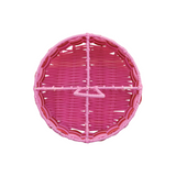 Pink woven basket with a handle on a white background