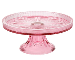 Small pink glass cake stand

This lovely pink glass cake stand brings a touch of whimsy and vintage charm to any dessert presentation. Its delicate pattern and refined design make it perfect for showcasing your baking creations during special occasions.

Materials:
Glass

Dimensions:
3 1/2" high x 8 1/4" diameter