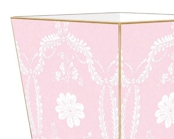 Pink floral wastebasket 

Enhance your space with our beautifully hand-painted wood wastepaper basket. Each basket is crafted with care, combining durability with stunning artistry, making them a perfect addition to any room. The artwork is hand-cut, decoupaged, and polished by a small team of artisans in Texas. Each wastepaper basket is carefully painted gold around the edges as the perfect finishing touch.
