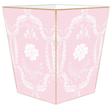Pink floral wastebasket&nbsp;

Enhance your space with our beautifully hand-painted wood wastepaper basket. Each basket is crafted with care, combining durability with stunning artistry, making them a perfect addition to any room. The artwork is hand-cut, decoupaged, and polished by a small team of artisans in Texas. Each wastepaper basket is carefully painted gold around the edges as the perfect finishing touch.
