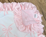 Luxurious pink ribbon blanket
*Made to order*

Made from high-quality Minky fabrics, which comprise luxuriously soft microfibers, this pink and white baby blanket features a matching satin ruffle trim. It is the perfect size for nap time cuddles. This blanket would be a great choice for a baby shower gift.

This item is proudly made in the USA.

Materials:
Minky fabrics

Dimensions:
30" wide x 30" high

Care:
These blankets should be washed on a gentle cycle by themselves, in cold water and mild non-chlorin