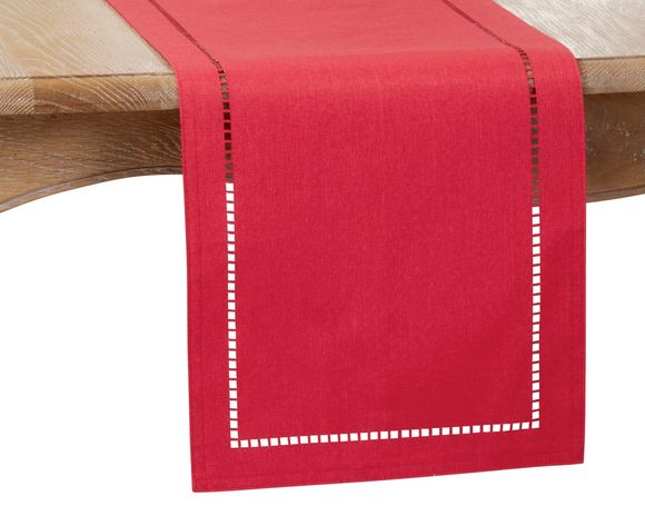 Add a touch of timeless style to your everyday dining with this classic hemstitch table runner. It's the perfect understated foundation to highlight your favorite dinnerware and table decor. Complete the look with coordinating placemats and napkins.
