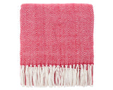 Red and white herringbone patterned throw blanket with fringes on a white background