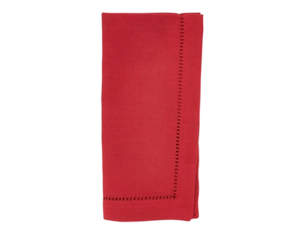 Red napkin with hemstitching on a white background