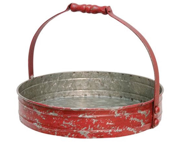 Red distressed round metal tray with handle

This red tray is made of galvanized metal and features a distressed finish. It has a metal strap handle that extends across the top and a red wooden grip. This tray is perfect for year-round use, as well as during the holidays.

Materials:
Metal, wood

Dimensions:
8