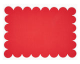 Red placemat with scalloped edge on a white background