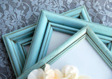 muted aqua blue hand-painted picture frames for gallery walls