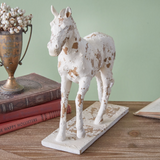 This majestic equine boasts elements from the architecture of the Roman Empire. Feature on a table or shelf for a quick, sophisticated touch in a room. This piece is a great choice for a gift.  Materials: Resin  Dimensions: 11 1/4" high x 3 1/2" deep x 13" wide