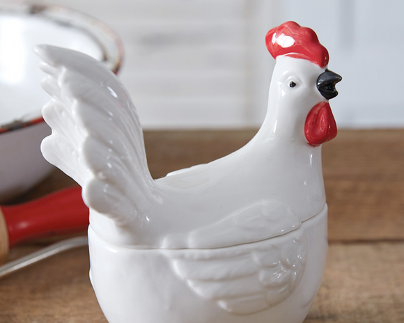 White & red rooster canister

Your next gathering just became more endearing with our ceramic rooster canister. Keep sugar, tea bags, and more inside of this container. This item is made of ceramic and features rubber stoppers.

Materials:
Ceramic

Dimensions:
5 1/2