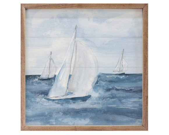 Framed artwork of sailboats on a blue ocean with a white sky.