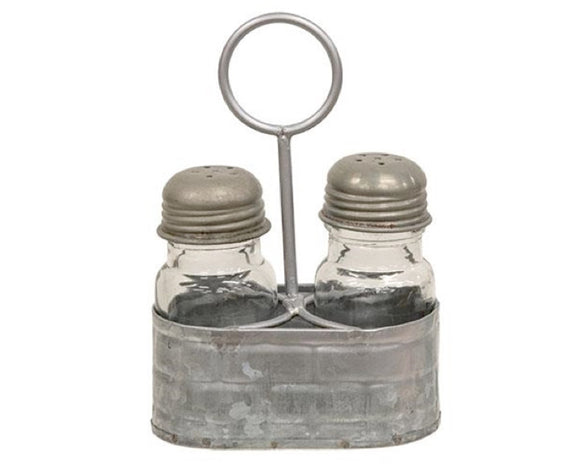 Galvanized metal salt & shaker set caddy

This caddy is a vintage-inspired piece made of galvanized silver metal with a raised pattern and a circular handle attached to the middle. Either side of the caddy holds a glass seasoning shaker with a screw-top metal lid with holes at the top. Fill these shakers with salt and pepper, and display this caddy on any tabletop, riser, or other kitchen surface for easy access with a decorative, farmhouse-inspired touch.

Materials:
Metal, glass

Dimensions:
4 1/4