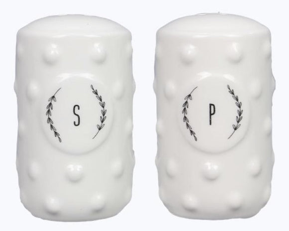 White salt and pepper shakers with 'S' and 'P' labels on a white background