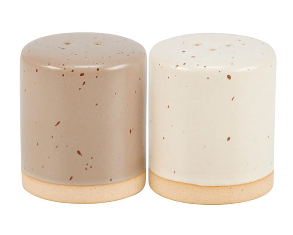 Neutral beige speckled salt & pepper shaker set

This set of stoneware salt and pepper shakers feature a cottage greige and cream finish on each with bare ceramic accents. The shakers include unique openings to tell them apart, as well as plastic stoppers for easy refilling and cleaning. This rustic set of tabletop accessories are perfect for everyday gatherings.

Materials:
Stoneware, ceramic, rubber

Dimensions:
2 3/4