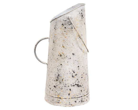 Our distressed metal flower bucket is a tall, metal container with a unique design. The rustic patina and textured finish enhance the vintage appearance of this oversized pitcher. Use it to hold faux florals for an eye-catching centerpiece or simply display as a standalone farmhouse accent. 

Materials:
Metal

Dimensions:
7 1/2