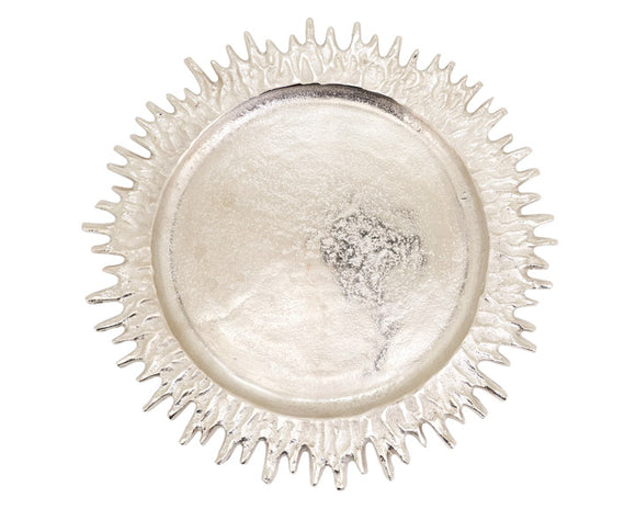 Decorative silver plate charger with a textured rim on a white background