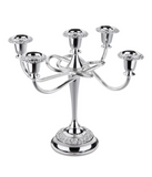 Silver candelabra with decorative elements on a white background