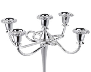 Silver candelabra with crystal accents on a white background