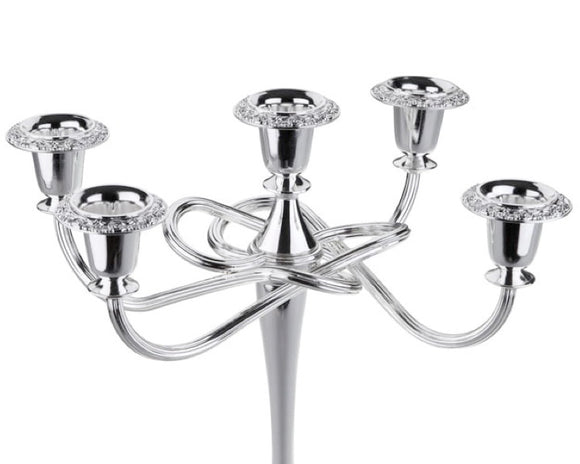 Silver candelabra with crystal accents on a white background