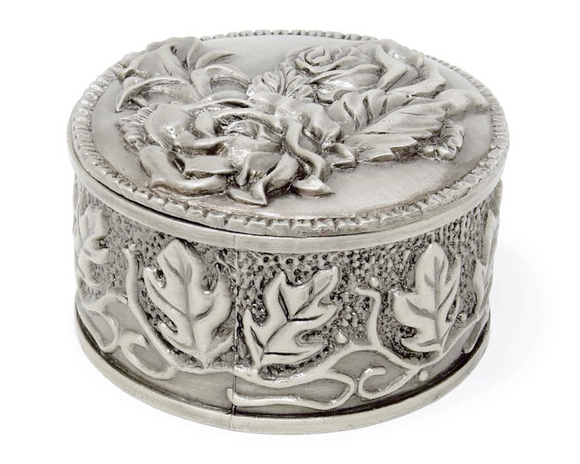 Pewter vintage rose embossed round box

This beautiful trinket box is perfect for storing keepsakes, small pieces of jewelry, rosary beads and other sentimental mementos. It is made of pewter alloy, features a hand-embossed design, and a premium black velvet interior. 

Materials:
Pewter, velvet

Dimensions:
2 1/4