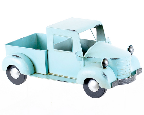 Light blue vintage truck model on a white background