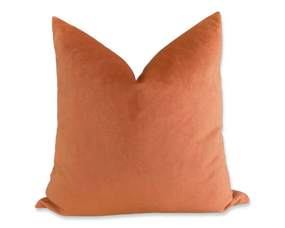 Orange pillow on a white background
