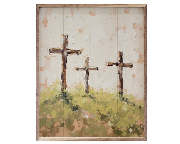 Painting of three crosses on a textured wall with a wooden frame.
