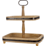 Two-tiered wooden tray with metal bands and handle on a white background