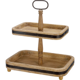 Two-tiered wooden tray with a central handle on a white background