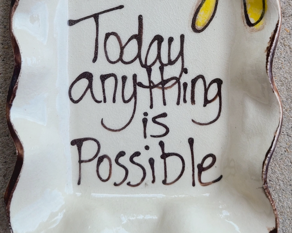 Small 'Today Anything Is Possible' hand-painted plate

Serve up small appetizers or make a treat for yourself with this charming rectangular plate. Made of stoneware and food safe, it features the phrase 