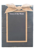Black wooden board with a gold bow and 'Verse of the Week' text