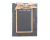 Black notepad with a gold ribbon and 'Verse of the Week' text on a white background
