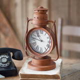 Vintage style lantern clock

Fashioned as a repurposed kerosene lantern, this unique clock will bring a rustic touch to a home. This item can be hung with a hook by its metal loop or placed on a shelf. This clock requires one AA battery, which is not included with your purchase.

Materials:
Metal, plastic

Dimensions:
8" wide x 6" deep x 12 3/4" high