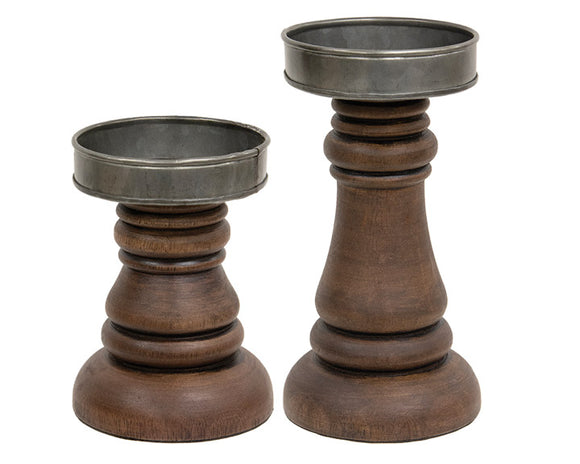 Walnut-stained wooden candle holders

These walnut-stained wood and metal candle holders look great with vintage farmhouse decor and are perfect holding our 3