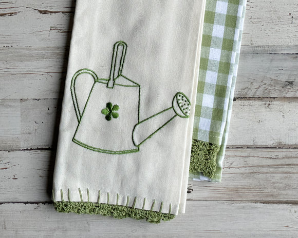 Green watering can kitchen towel set

Whether displayed as part of your spring decor or used year round, these adorable towels are perfect for your kitchen. One towel features a watering can design, and the other has a buffalo check design. 

Each set comprises one towel of each design. 

Materials:
Cotton

Dimensions:
18