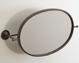 Vintage style oval wall mirror

Use this mirror in your bathroom to add some vintage charm. It is made out of metal and operates on a functioning swivel for multi-functional use. There are four screw holes for hanging. This is a great choice for a guest room.

Materials:
Metal, glass

Dimensions:
15 1/4" wide x 6 1/2" deep x 27 1/2 long overall