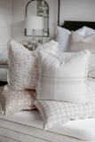 Brown floral throw pillow with fringe edging

This pillow brings timeless elegance and cozy charm to any space. With soft white, cream, taupe, and beige tones, this pillow features a delicate floral pattern paired with textured details and frayed edges. Perfect for layering on beds, couches, or chairs, these pillows add sophistication to any decor. Crafted from high-quality materials, this collection is both durable and stylish. 