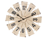 Oversized 24-inch rustic metal wall clock shaped like a farm windmill with twelve distressed white iron blades and bold black Arabic numerals.
