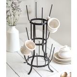 Rustic metal coffee mug tree rack

This tall rack is inspired by a wine bottle rack. It's the perfect size to hold juice glasses or coffee mugs. This stand is a great choice for a housewarming gift.

Materials:
Metal

Dimensions:
11" wide x 19" high