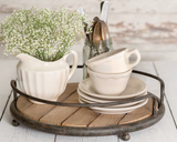 Rustic farmhouse round wood plank serving tray

Add rustic style to a dining room server or bathroom counter with this lovely tray. It features a plank wood base and metal accents. Its size makes it perfect for carrying small dishes. This tray is a great choice as a housewarming gift.

Materials:
Wood, metal

Dimensions:
4" high x 14 1/2" diameter
