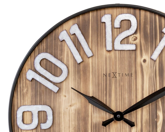 Large wooden wall hanging clock

This large industrial wall clock has a real wooden clock face with a visible natural wood grain pattern. The combination of oversized silver numbers set in slim black metal rims and black hands gives it a rural, yet modern sophisticated touch. This clock runs on one AA battery, which is not included with your purchase.

Materials:
Wood, metal

Dimensions:
20