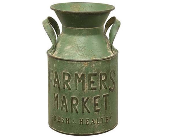 Olive green metal milk can with the words 