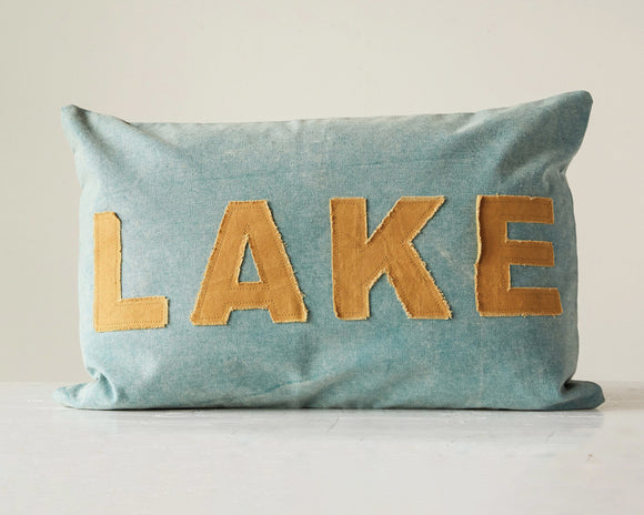 Decorative lumbar pillow with 'Lake' applique