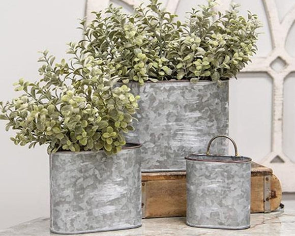 Set of galvanized metal oval planters