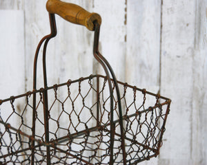 Rustic two-tiered metal display basket stand