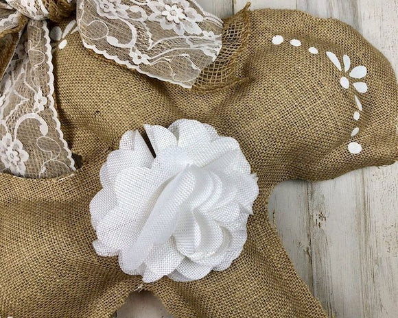 Whether you prefer traditional home accents or farmhouse decor, this burlap fabric cross will add the perfect amount of vintage-inspired style to your home. It is perfect for Easter. It would look wonderful on your front door or covered patio entrance.

Materials:
Burlap, lace

Dimensions:
17